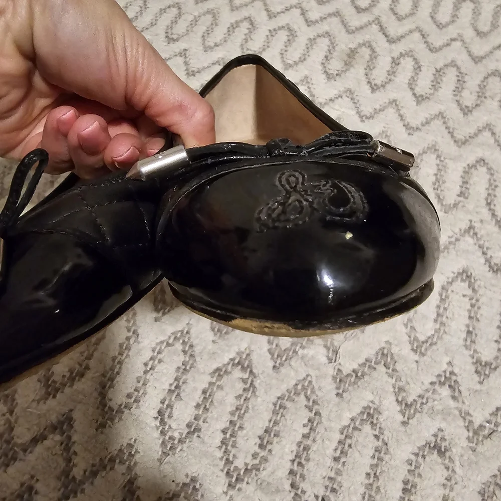 SAM EDELMAN quilted black leather flats with lace bow. Used size 5